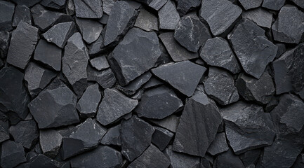 Fototapeta premium Black slate stone wall cladding surface, textured rough background for design