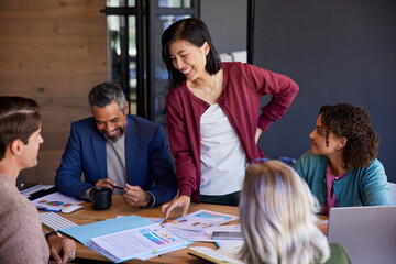 Happy business team collaborate during a meeting