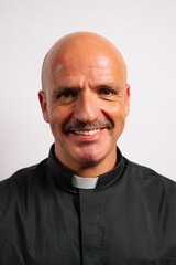 Fototapeta premium Portrait of a priest looking at the camera.