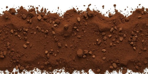 A pile of dark brown soil isolated on a white background, raw materials, ground, pile
