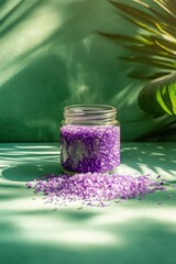 a jar of purple  body salt crystals on a table with lavender flowers and sunlight on wall background
