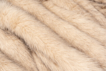 Texture of faux fur as a background, top view.