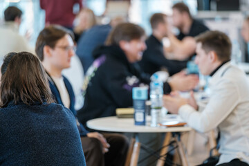 Group of professionals discussing ideas at a conference table, fostering teamwork and collaboration.