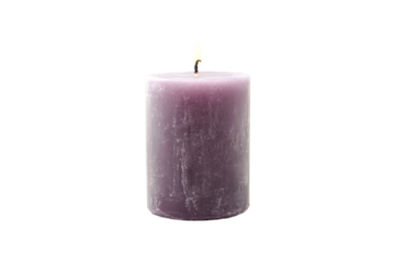 Purple pillar candle with a lit wick a simple home decor item,