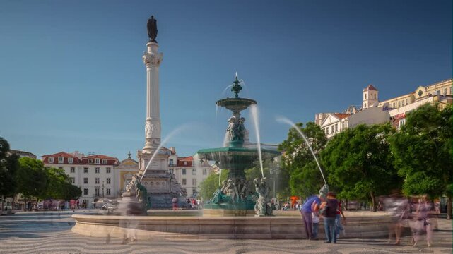 LISBON, PORTUGAL - JANUARY 19, 2025: Iconic fountain in Rossio Square with graceful water jets and vibrant city atmosphere