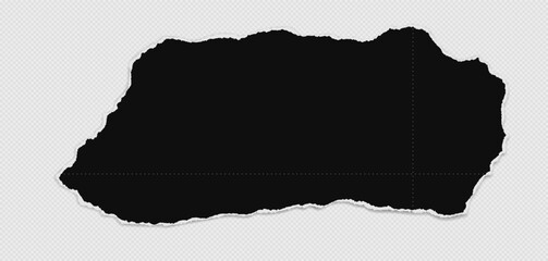 Black pieces of paper is on squared background for text, notes or ad.