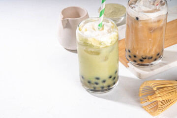 Classic and green matcha boba bubble tea with tapioca pearls