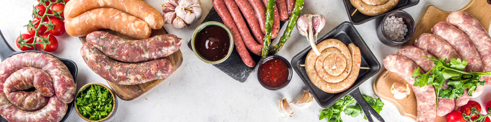 Set of different raw sausages