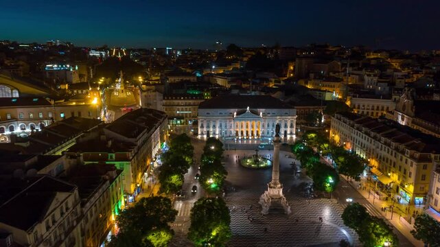 LISBON, PORTUGAL - JANUARY 19, 2025: Nighttime view of the vibrant Rossio Square showcasing lights and architecture