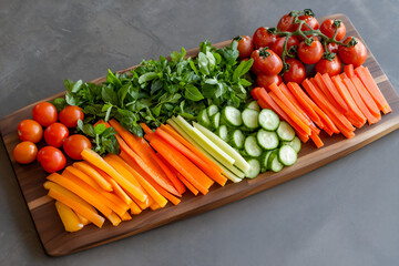  a colorful vegan vegetable platter with bell pepper strips,