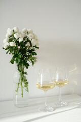 An Elegant Table Setting Featuring Beautiful Flowers and Bubbly Champagne for Celebration