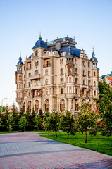 Fototapeta premium Multi storey residential building suburb city, house background sunny summer day