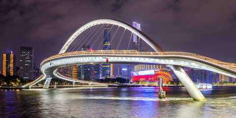 Guangzhou skyline with Haixin Bridge and skyscrapers panorama at night in Guangzhou, China