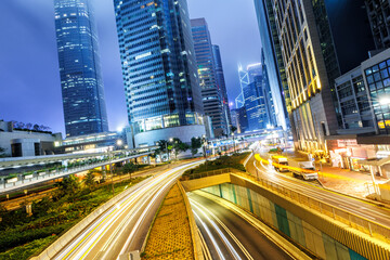 Fototapeta premium Hong Kong at night traffic with streets and skyscrapers in Hong Kong, China
