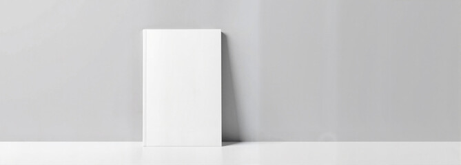 A5 book mockup on minimalist gray background