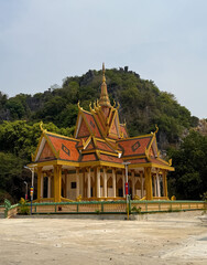 Naklejka premium Majestic Caves and Mountains of Kampong Trach, Cambodia. Discover the awe-inspiring natural beauty of Kampong Trach, Cambodia, where dramatic limestone mountains surround a network of enchanting caves