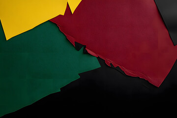 February Black History Month. Abstract Paper geometric black, red, yellow, green background. Copy space, place for your text.