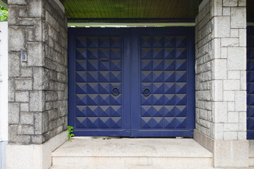 Architectural elements connecting exterior and interior spaces, showcasing various door designs.