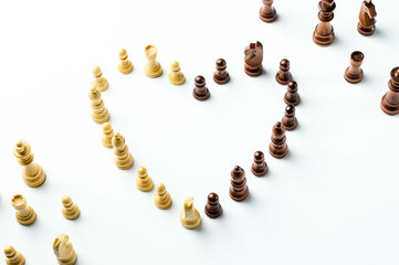 Chess Pieces in a Heart-Shaped Composition. Chess-Inspired Heart Design. Chess Pieces on a Minimalist Background.