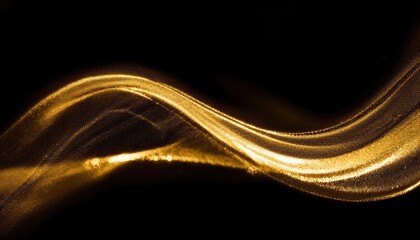 Abstract golden wave with glittering light effects flows on a black background