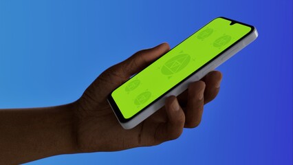 Black African-American old male using smartphone with a blank green screen. Mobile app video...