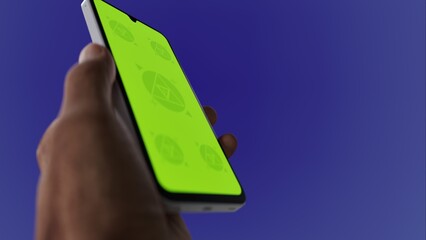 Asian old male using smartphone with a blank green screen. Mobile app video mockup. Vertical phone orientation