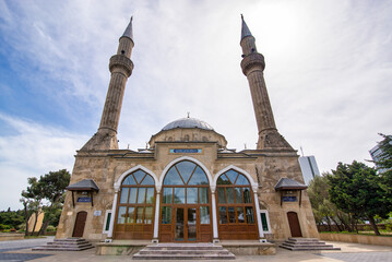 Sehitler Mosque, aka Mosque of the Martyrs in Baku, Azerbaijan, boasts two imposing minarets and an...