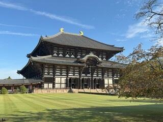 Todai-ji, the Japanese Buddhist temple, the largest wooden structure in the world, stands gracefully under the blue sky, built in Nara period, when Nara city originally served as the capital of Japan.
