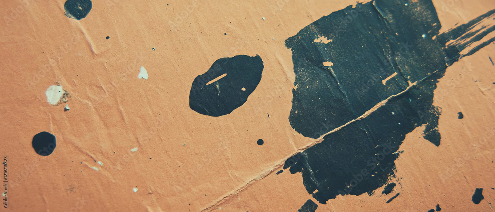 Poster artistic texture of kraft paper featuring ink smudges and dark marks for creative projects