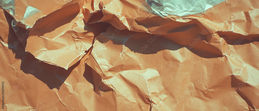 Poster textured kraft paper with tears and irregular edges showcasing a distressed appearance