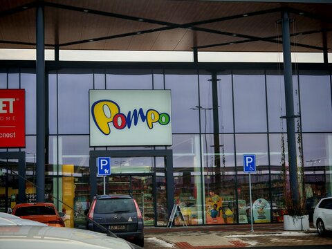 Prague,Czech Republic-January 8 2025: POMPO toy store exterior signage, colorful branding and entrance of retail store with children&rsquo;s toys and games


