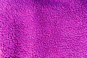 Luxury fashionable of purple wool fluffy plush fleece fur fabric texture background.