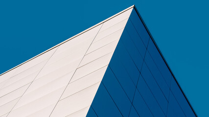 fragment corner of a modern building on a blue background