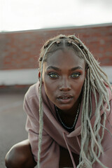 Beautiful Woman With Green Eyes And Blond Dreadlocks Portrait, Urban Fashion Photography