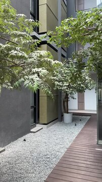 Japanese style terrace or outdoor area of Fulmar Hotel, Pasteur. modern and minimalist architecture design with green concept for relax and natural vibes