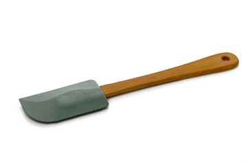 Kitchen utensil with a bamboo handle and silicone blade for versatile cooking tasks