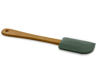 Silicone spatula with wooden handle ideal for cooking and baking in a modern kitchen setting