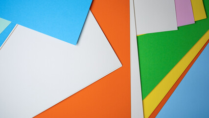 Colorful paper assortment arranged for artistic projects and crafts