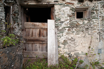 Fototapeta premium Door of an Ancient Mountain Barn in Switzerland