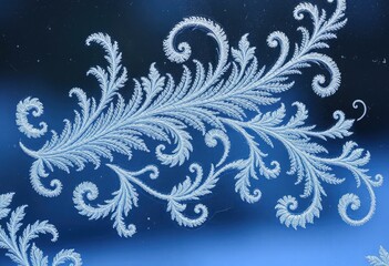 An intricate frost pattern etched on a window glass, resembling delicate feathers and swirling floral designs