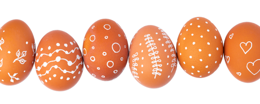 Natural brown Easter eggs with white minimalist patterns (hearts, dots, and lines) isolated on a transparent background