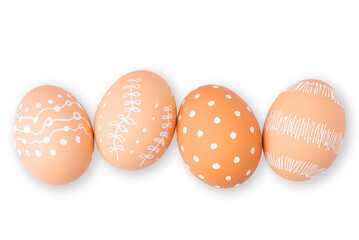 Natural beige Easter eggs with white minimalist patterns (hearts, dots, and lines) isolated on a transparent background