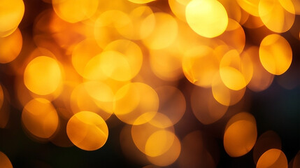 Abstract Yellow Bokeh Lights creating a Dreamy and Blurred Effect on Dark Background