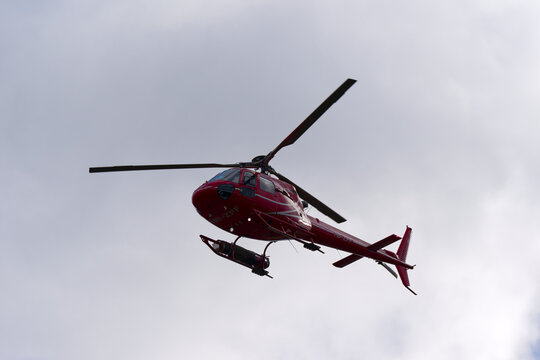 Airport Helicopter A&eacute;rospatiale AS 350B2 Ecureuil registration HB-ZPF arriving at Swiss Airport Z&uuml;rich Kloten on a winter day. Photo taken January 23rd, 2025, Zurich Kloten, Switzerland.