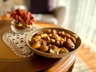 Roasted grilled chestnuts in plate ready to eat