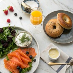 A luxurious flat lay of a brunch spread: smoked salmon, cream cheese bagel, mixed greens, and a mimosa, styled on a marble countertop.