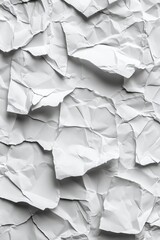 A close-up shot of a crumpled piece of paper, with creases and wrinkles visible
