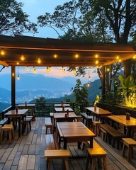 Fototapeta premium Attractive dining spot on a hill with views of the tall buildings in the city center