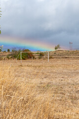 Big Rainbow in Santa Catalina de Somoza in the cloudy sky on the Camino de Santiago