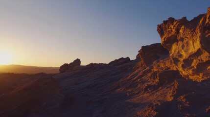 Fototapeta premium Sunset over Atacama Desert's Sculptural Rocks